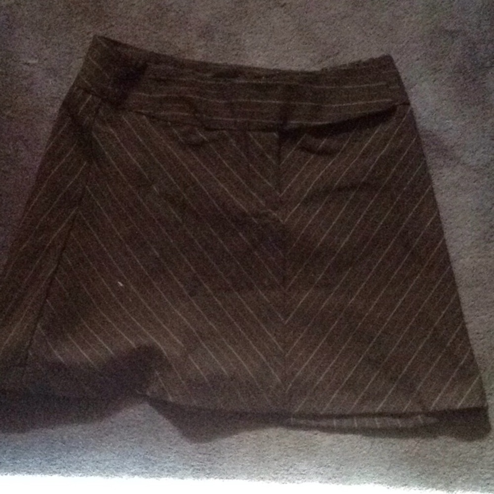 Black skirt with white and pink stripes